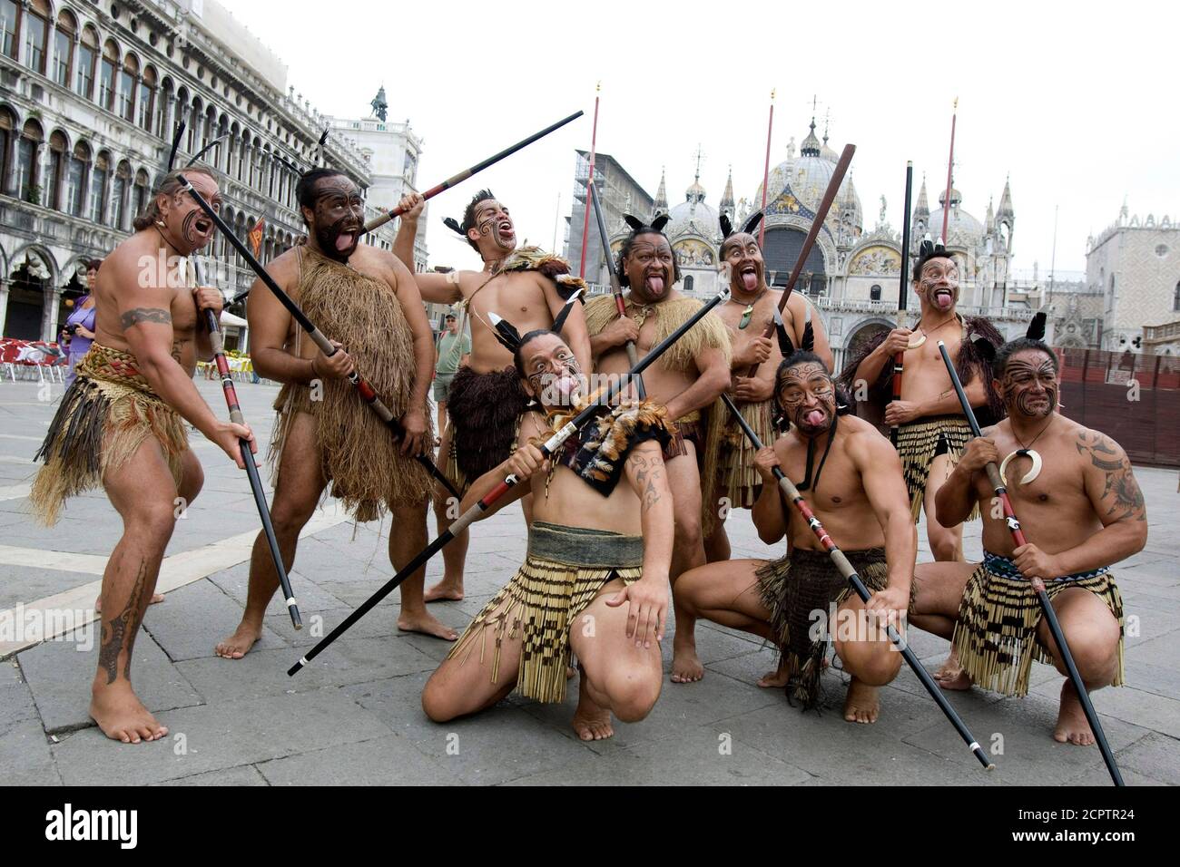 Members of traditional Maori group 'Waka Huia' perform in San Marco square, as part of the opening of the New Zealand pavilion at the Venice Biennale June 3, 2009. The Biennale, one of the world's major art festivals traditionally held every two years dating back to 1895, is open to the public June 7 - November 22, 2009. REUTERS/Tony Gentile  (ITALY SOCIETY) Stock Photo