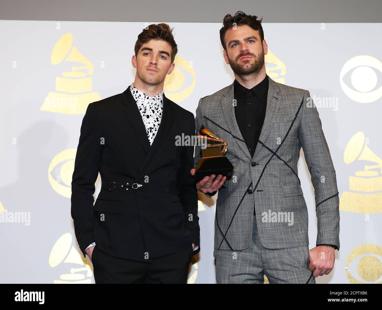 The Chainsmokers pose with the award they won for Best Dance Recording for  "Don't Let Me Down" at the 59th Annual Grammy Awards in Los Angeles,  California, U.S. , February 12, 2017.