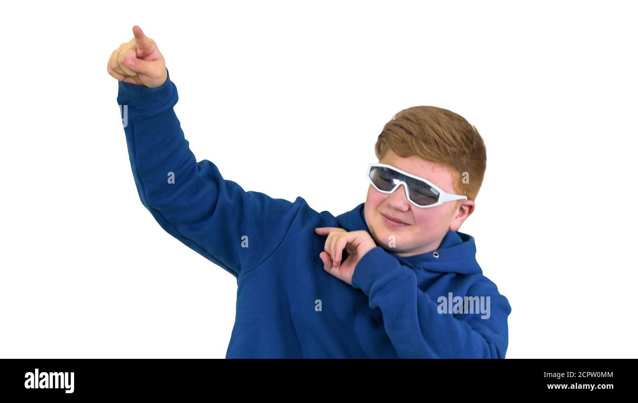 Teenager with sunglasses doing some cool dancing moves on white Stock Photo