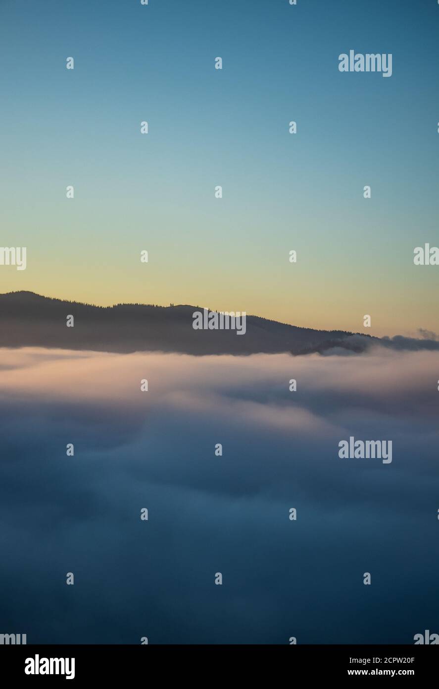 Over the clouds view, mountains in the background, sun rising time ...