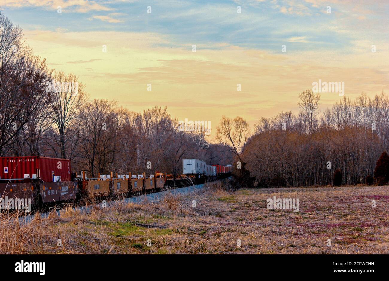 Freight train transportation is still very active as seen by this train hauling goods on a track near McKenzie, Tennessee. Stock Photo
