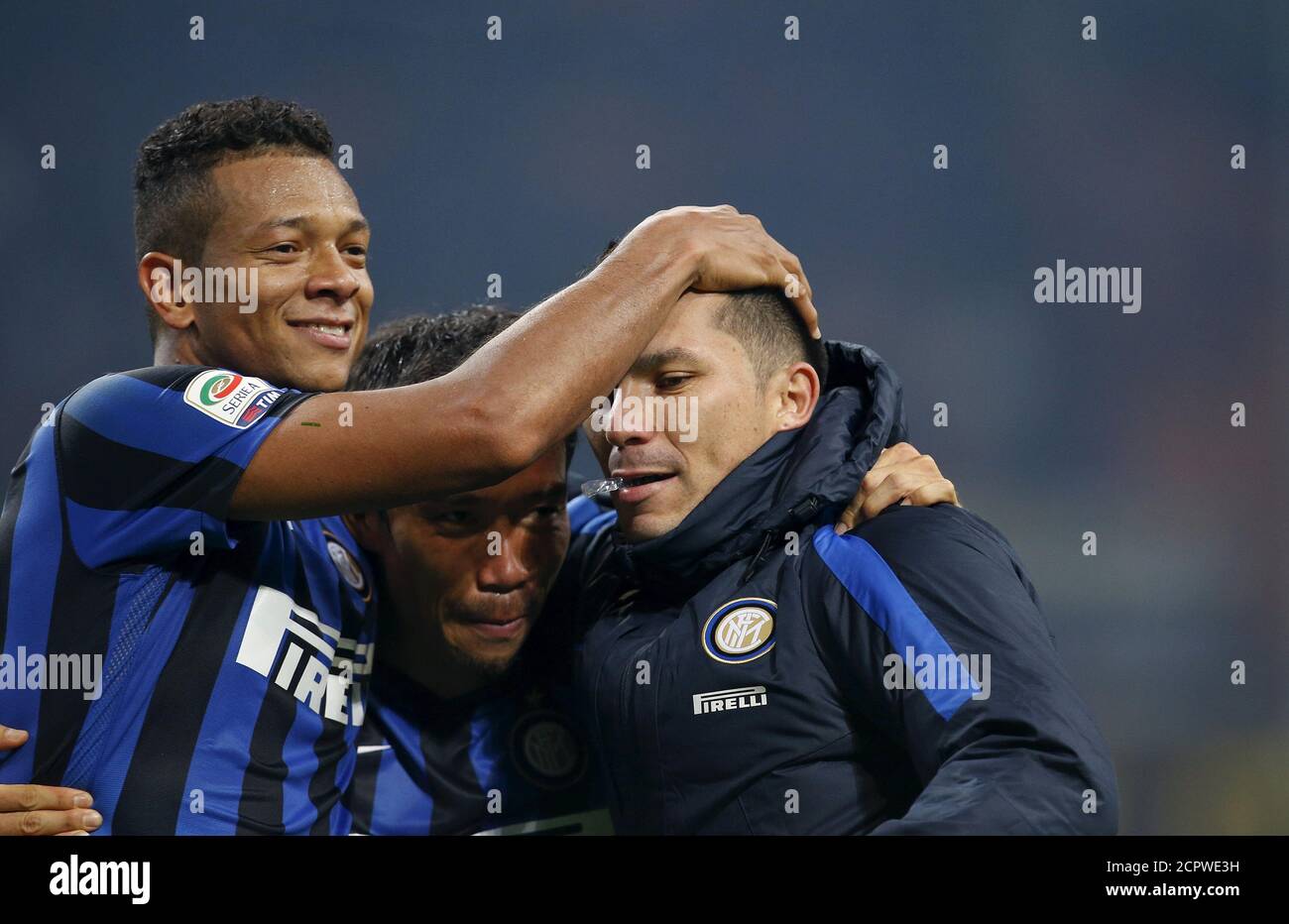 inter-milans-gary-medel-r-fredy-guarin-l-and-yuto-nagatomo-celebrate-at-the-end-of-their-italian-serie-a-soccer-match-against-as-roma-at-the-san-siro-stadium-in-milan-italy-october-31-2015-reutersalessandro-garofalo-2CPWE3H.jpg