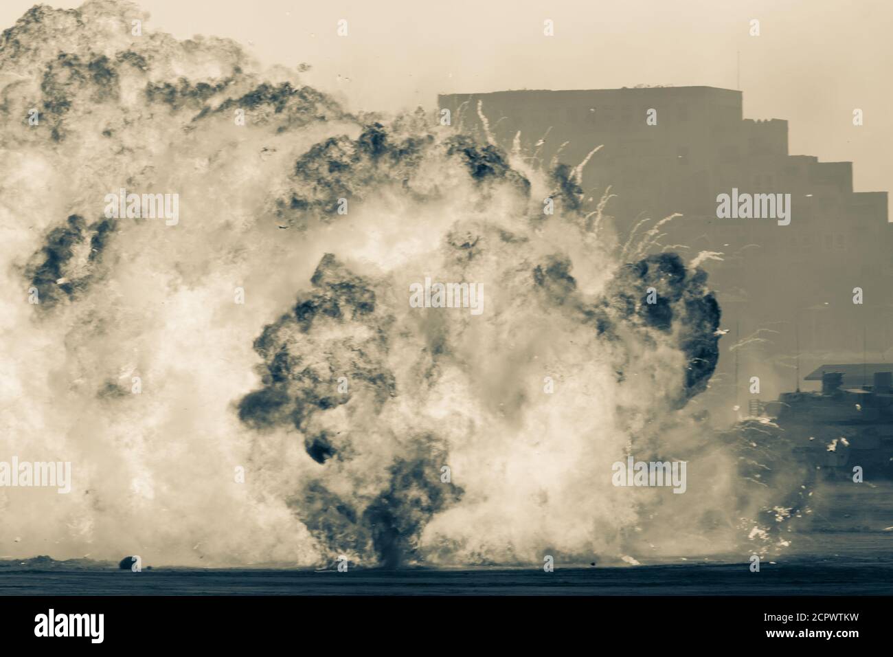 Massive fire explosion or strike in military combat and war. Vehicle ...