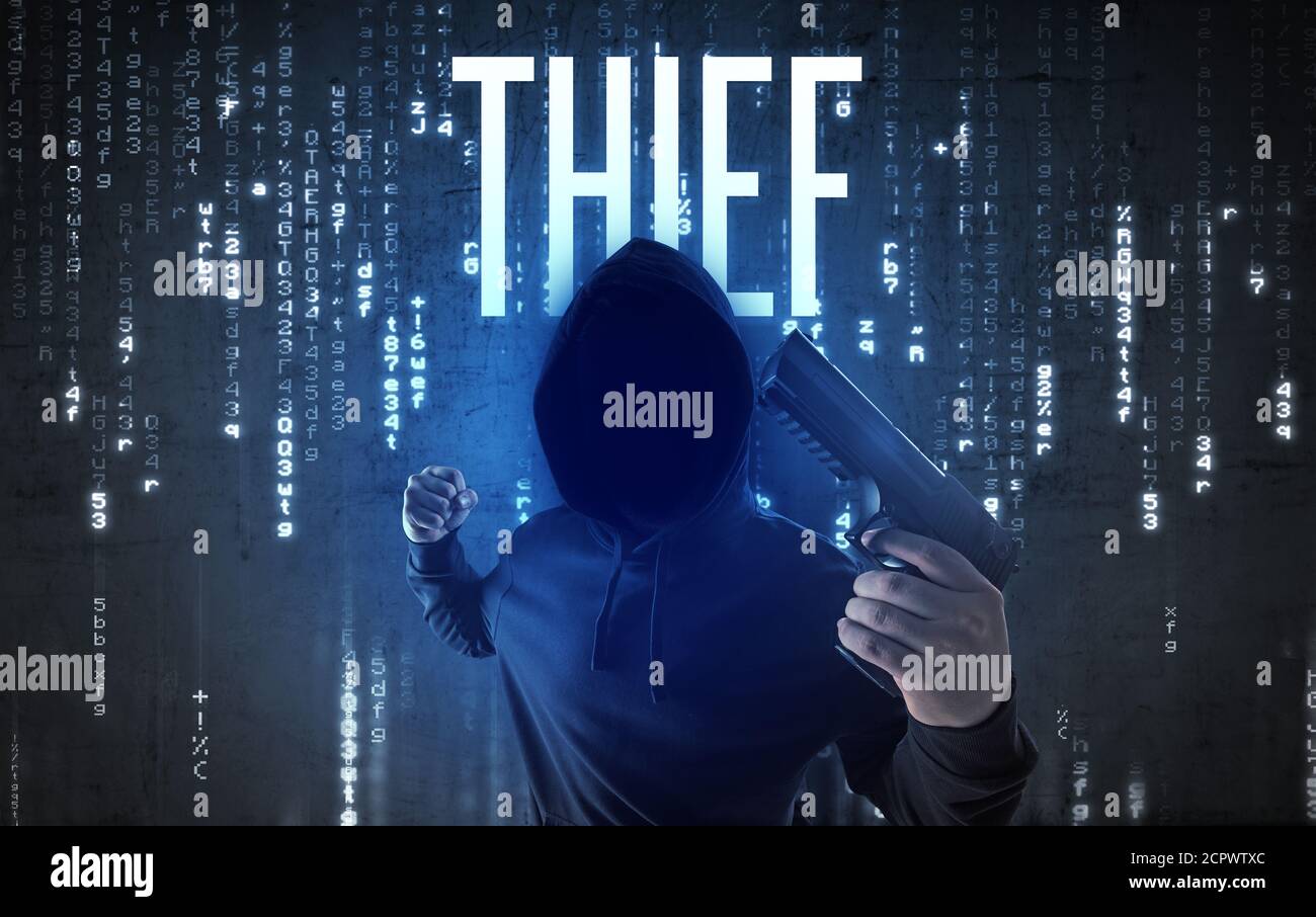 Faceless hacker with THIEF inscription, hacking concept Stock Photo - Alamy