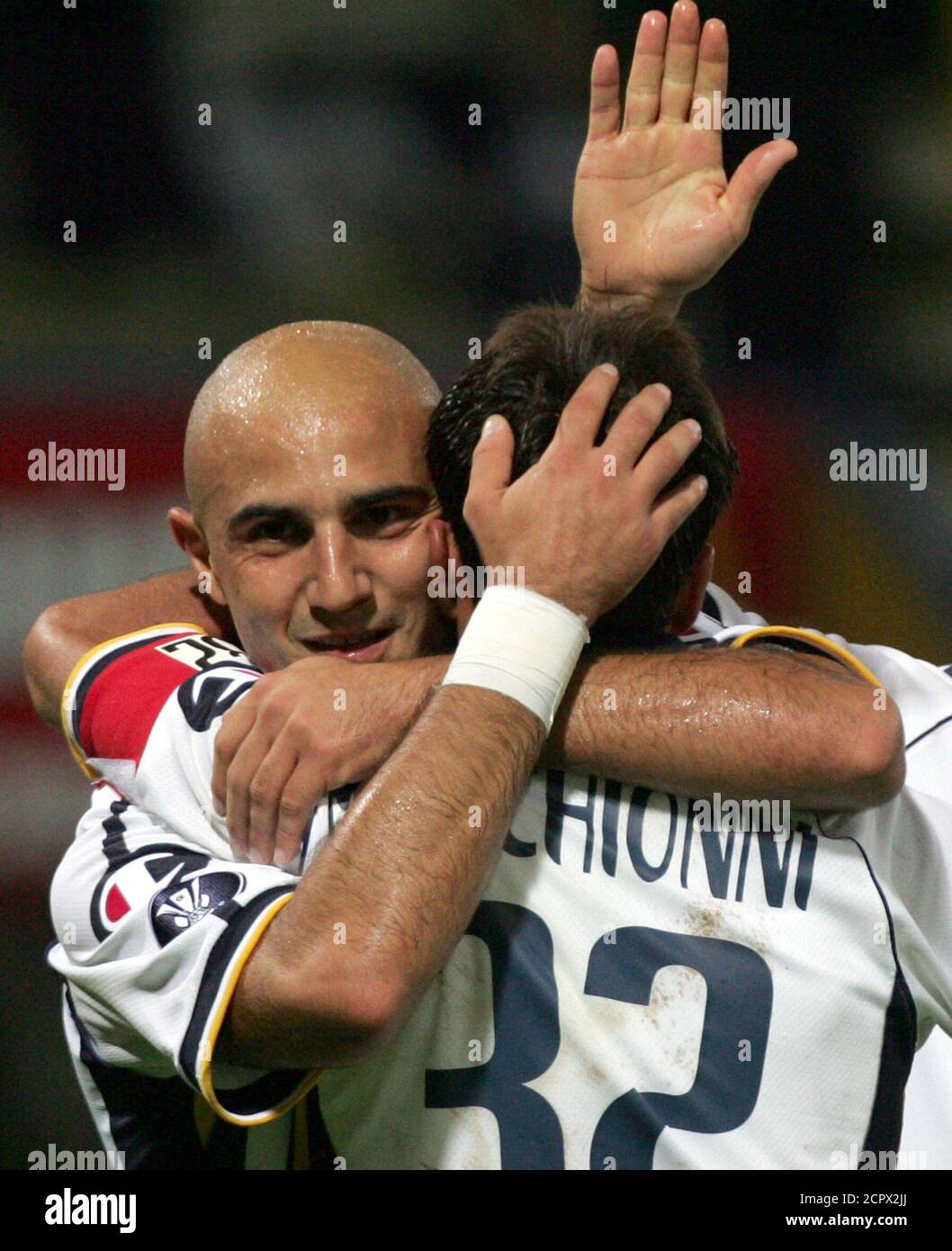 Parma's Marco Marchionni (R) celebrates with his team mate Massimo Maccarone after scoring against Maribor during their UEFA Cup first round, first leg match at the Tardini stadium in Parma, northern Italy September 16, 2004. REUTERS/Stefano Rellandini  SR/ABP Stock Photo