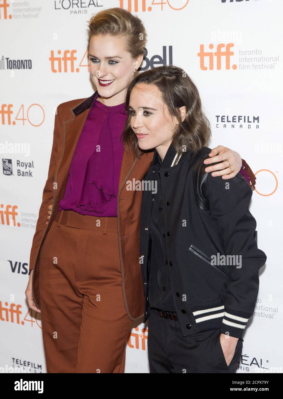 Ellen Page arrives with Evan Rachel Wood (L) on the red carpet for the film 'Into the Forest' during the 40th Toronto International Film Festival in Toronto, Canada, September 12, 2015. TIFF runs from September 10-20.   REUTERS/Mark Blinch Stock Photo