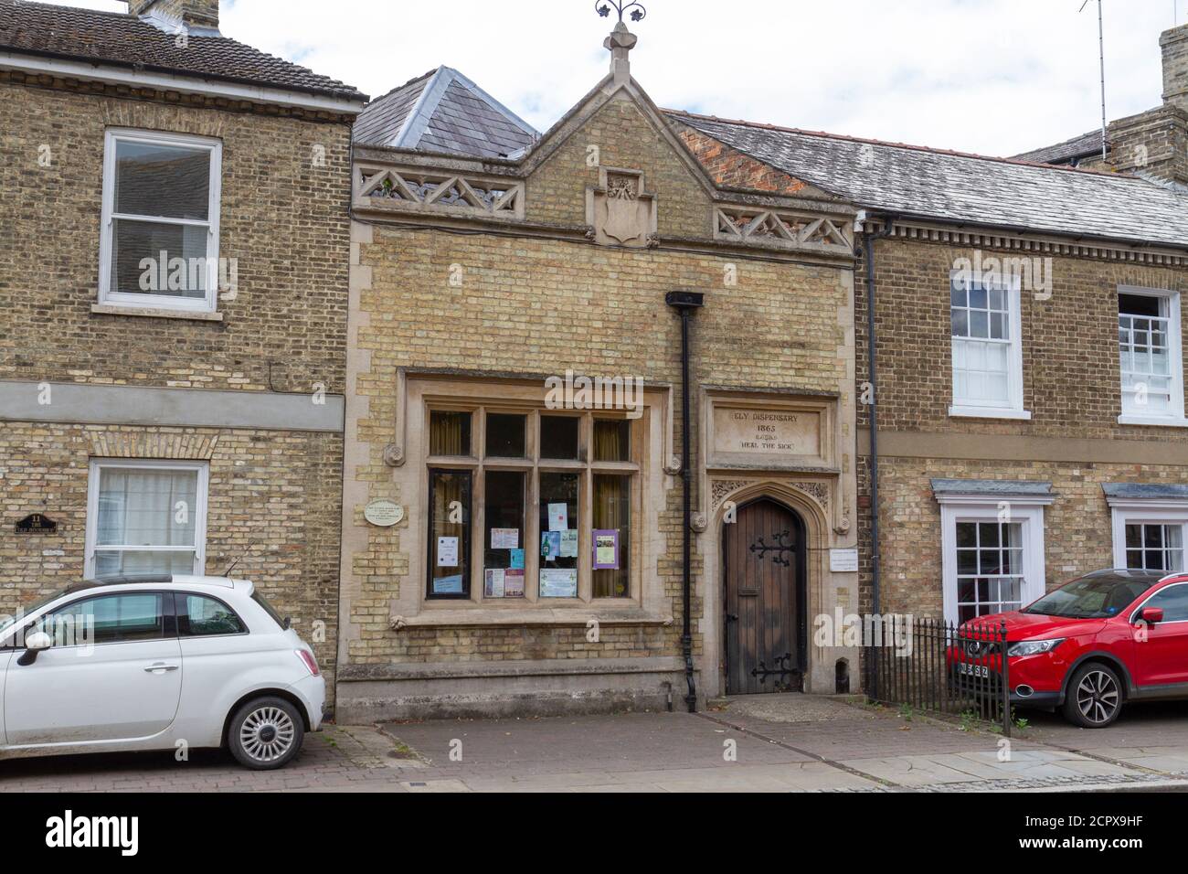 The Ely Dispensary ('Heal the Sick') on St. Mary's Street (1865), in Ely, Cambridgeshire, UK. Stock Photo