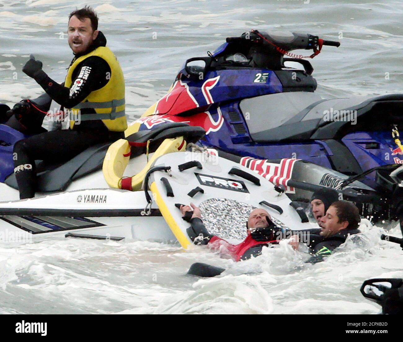 Rescue Swimmers Brace The Neck Of Australian Surfer Justen Allport With Their Hands After He Wiped Out During Competition At The Cape Fear Surfing Tournament Off Sydney S Cape Solander In Australia June Rescue Swimmers Brace The Neck Of Australian Surfer Justen Allport With Their Hands After He Wiped Out During Competition At The Cape Fear Surfing Tournament Off Sydney S Cape Solander In Australia June