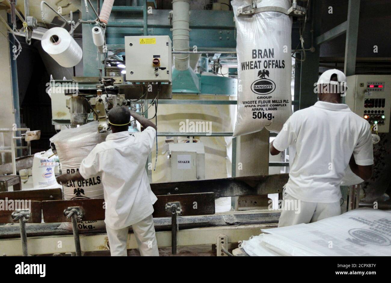 Flour mill workers in africa hires stock photography and images Alamy