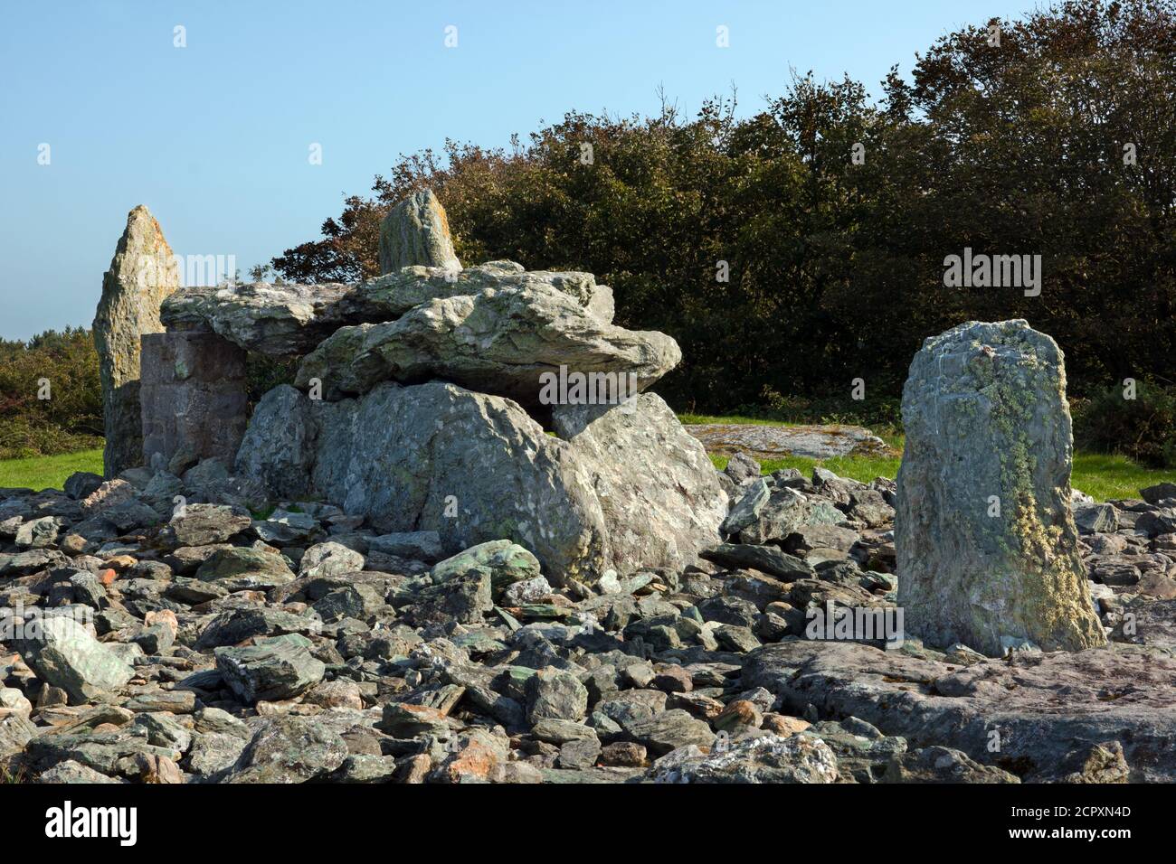 Trefignath is a Neolithic burial chamber near Trearddur, Holy Island, Anglesey in North Wales. It includes three stone tombs. Stock Photo
