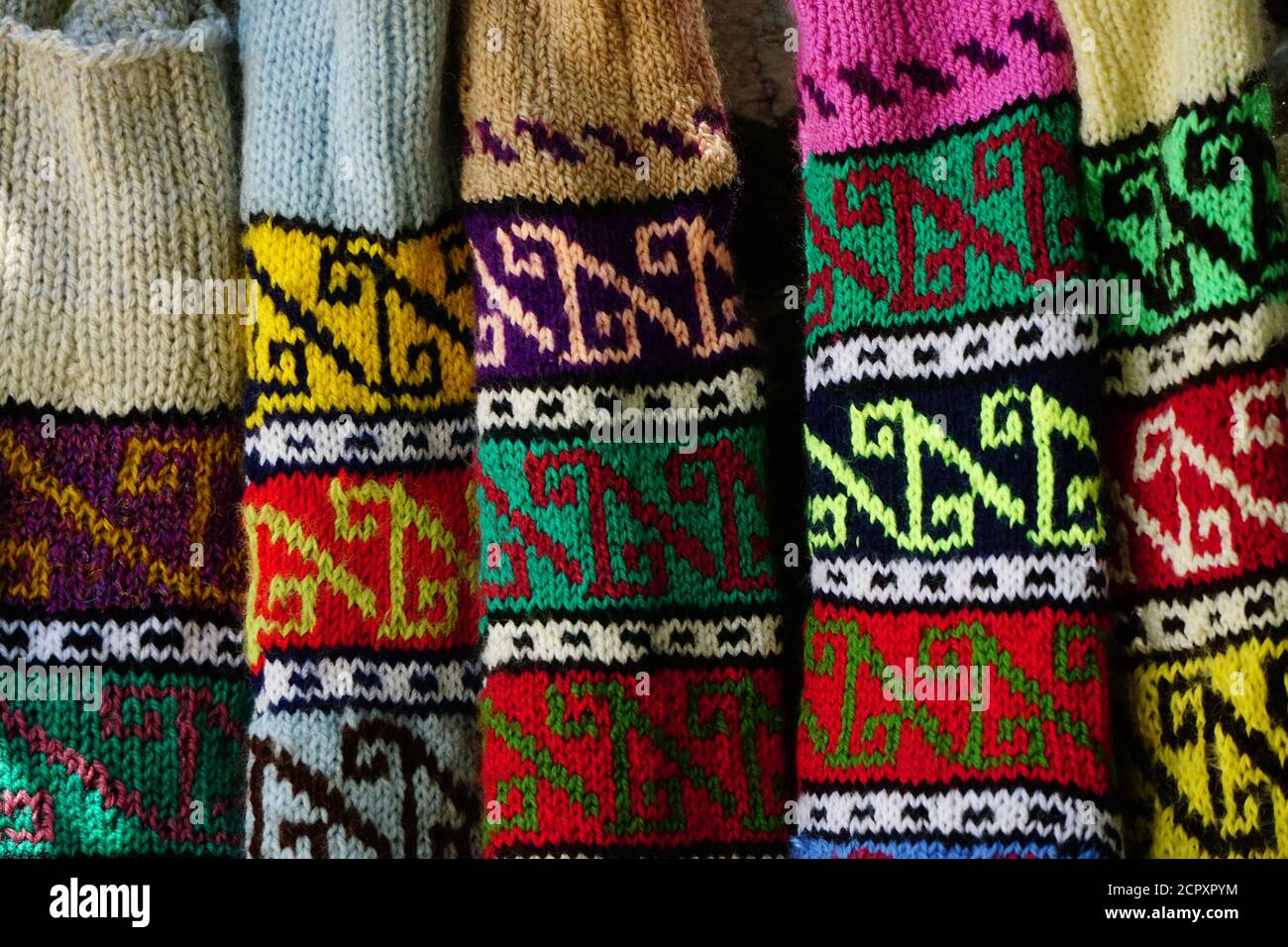 Hand knitting bootee with authentic patterns with vivid colors Stock ...