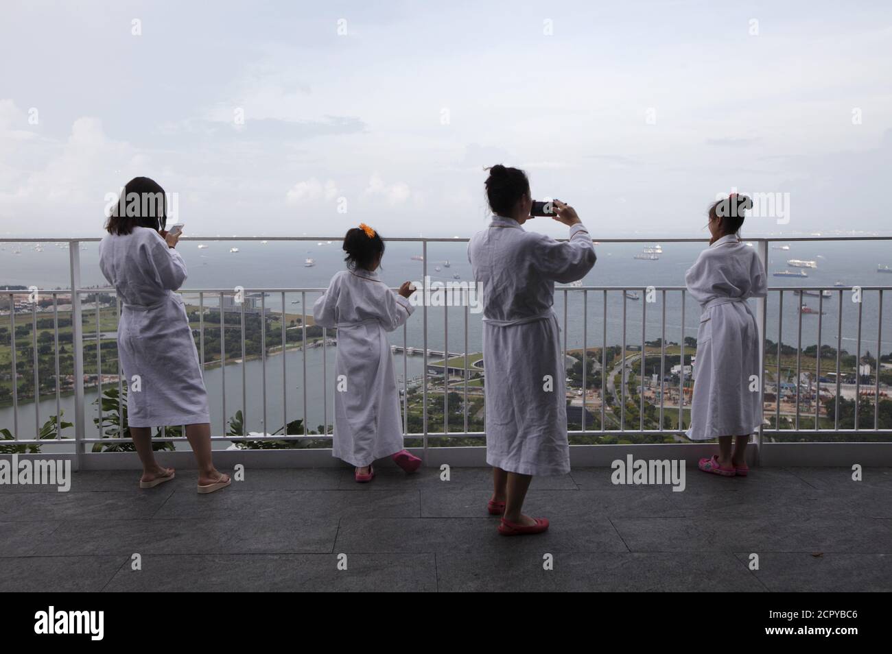 Hotel Guests Look Out From The Rooftop Of The Marina Bay Sands Hotel Singapore July 16 2015 When Singapore Celebrated Its 50th Birthday As An Independent Country In August The City State