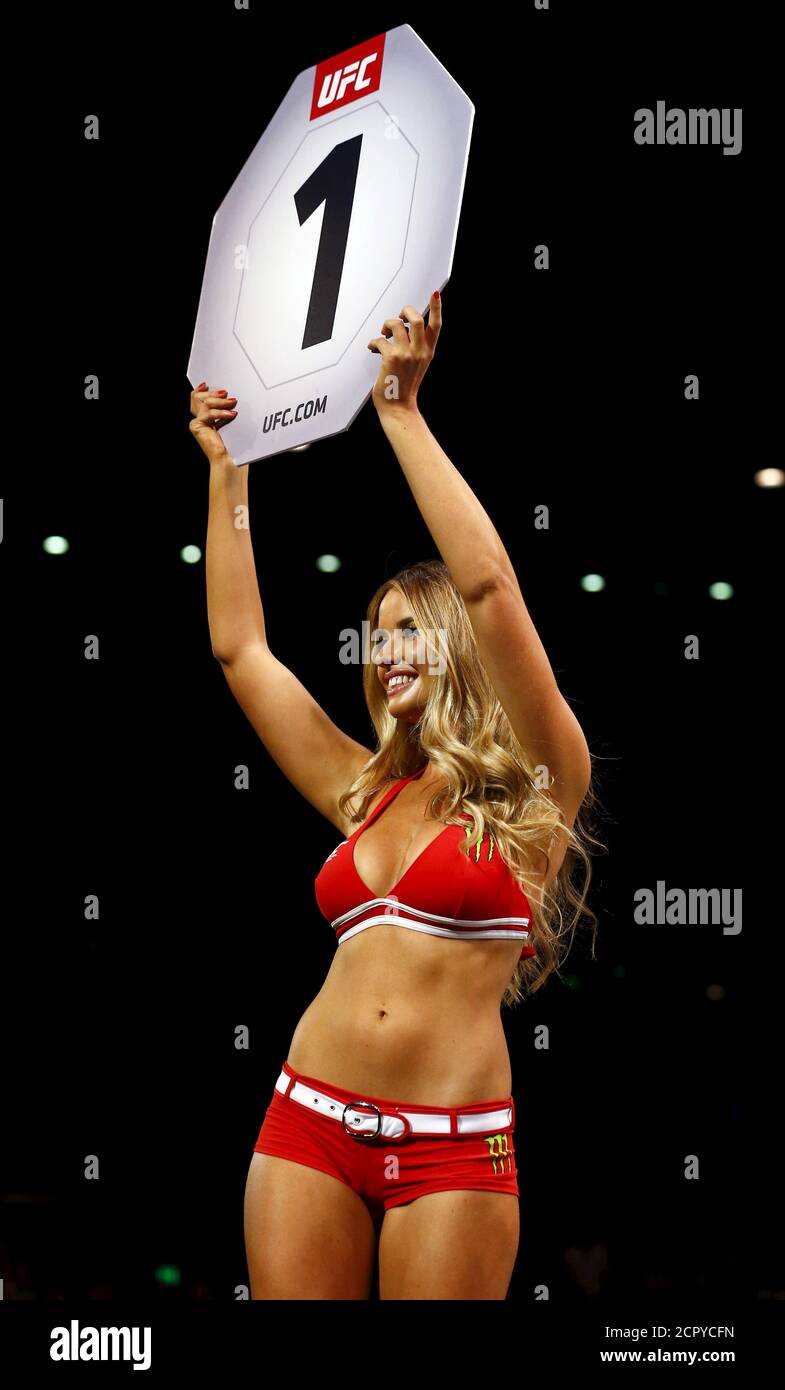 Mixed Martial Arts - Ultimate Fighting Championship (UFC) Fight Night -  Lightweight Bout - Brisbane Entertainment Centre, Brisbane, Australia -  20/3/16 - A ring girl displays a sign for the first round