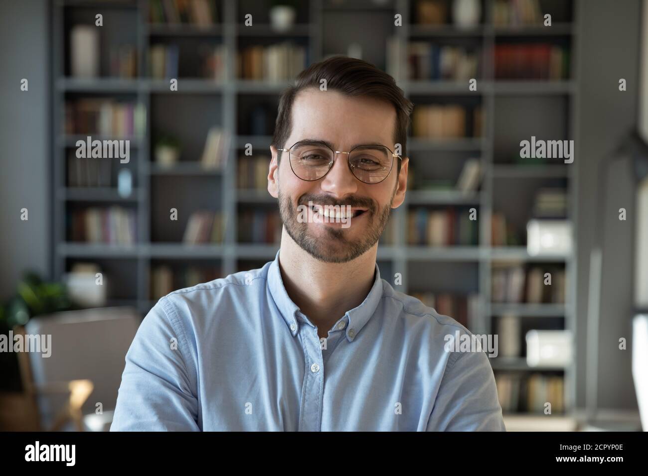 Profile picture of smiling 30s Caucasian man in glasses Stock Photo