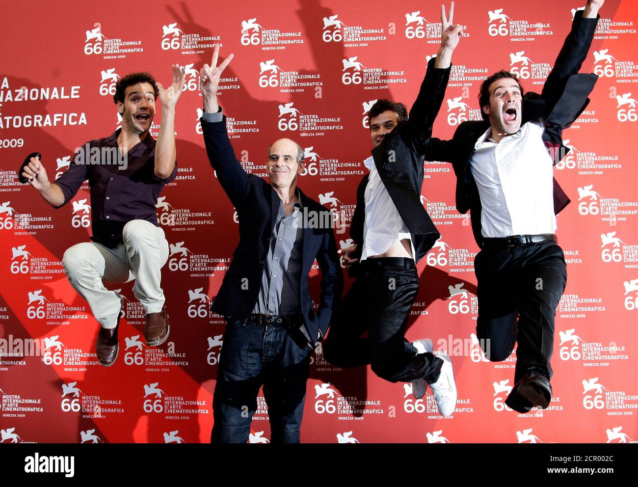 Film director Samuel Maoz (2nd L) and actors Yoav Donat (L), Michael Moshonov and Zohar Strauss (R) attend the 'Lebanon' photocall during the 66th Venice Film Festival September 8, 2009.  REUTERS/Tony Gentile (ITALY ENTERTAINMENT) Stock Photo