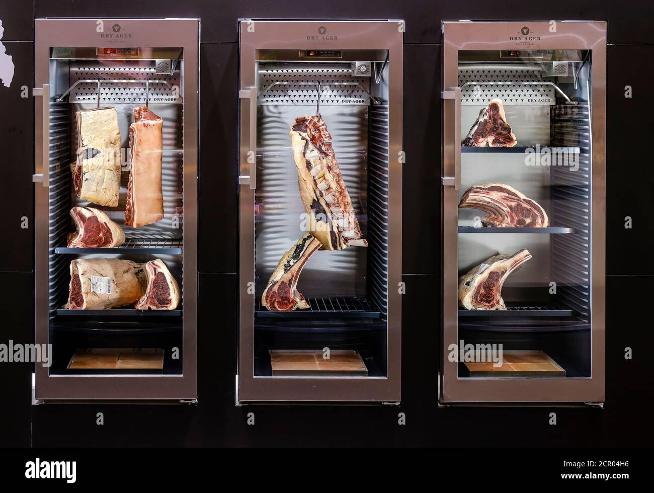 Steak meat, dry aged beef in the aging cabinet, ANUGA food fair, Cologne, North Rhine-Westphalia, Germany Stock Photo