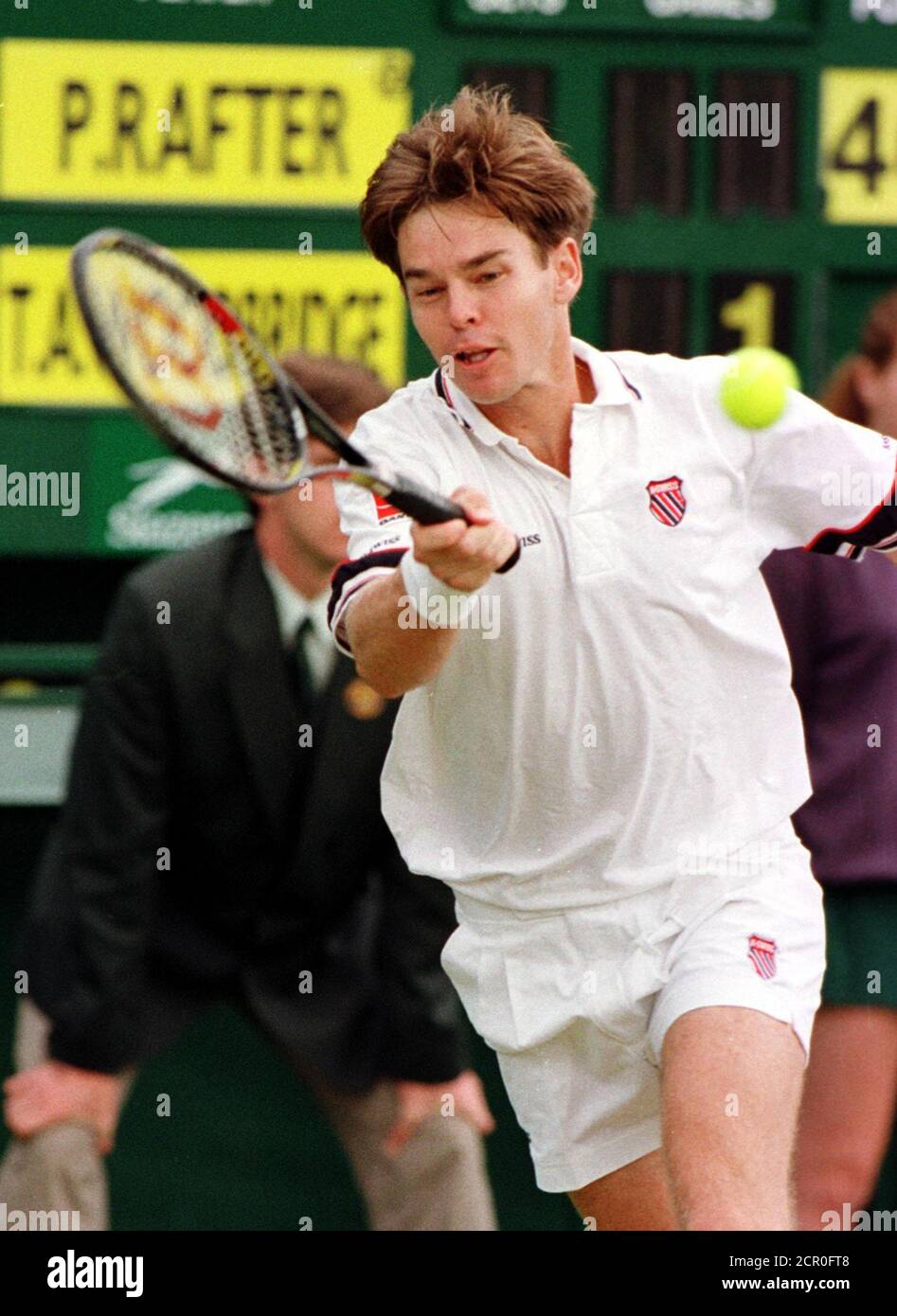 Australia's Todd Woodbridge plays a forehand return to compatriot Patrick  Rafter at the Wimbledon tennis championships July 1. Woodbridge is  currently ranked 37 in the world. SPORT TENNIS Stock Photo - Alamy