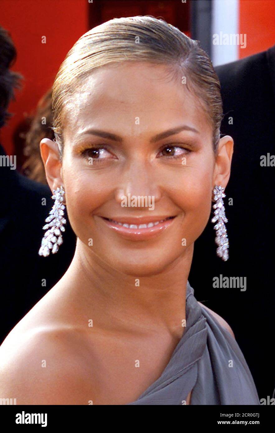 Actress Jennifer Lopez wears red fox fur false eye lashes as she arrives at  the Academy Awards in this file photo from March, 2001. Celebrity makeup  artist Valerie Sarnelle's newest Oscar accessory