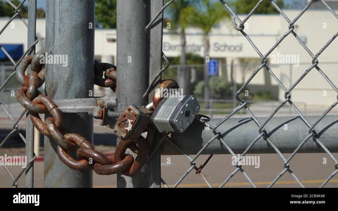 Locked entrance of elementary school closed due to Covid-19. Stock Photo