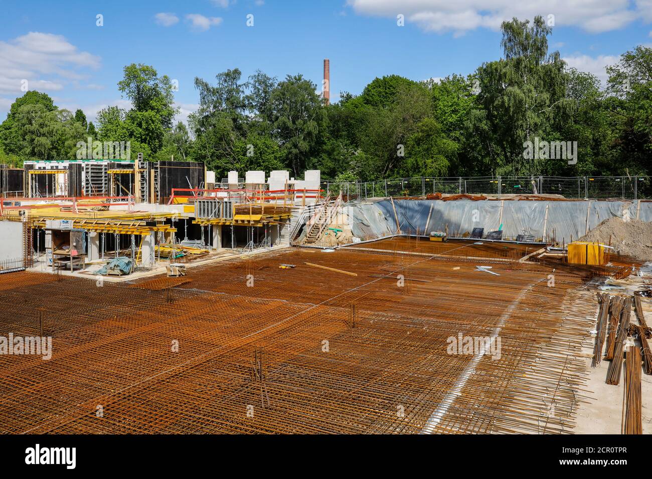 Reinforcement for concreting floor slab for underground car park, new multi-family houses construction site, Essen, North Rhine-Westphalia, Germany Stock Photo
