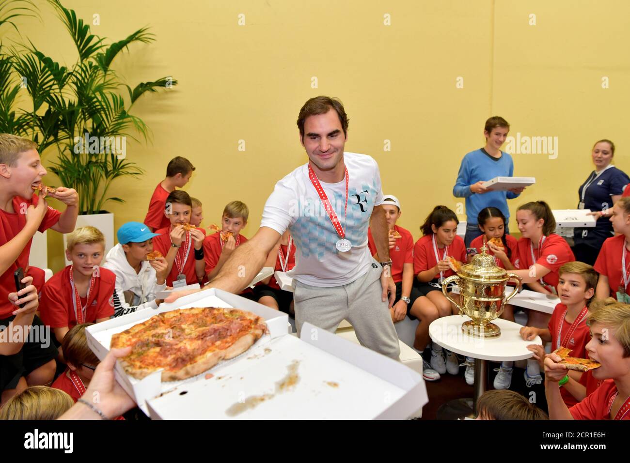 Tennis - ATP 500 - Swiss Indoors Basel - final - St. Jakobshalle, Basel,  Switzerland - October 29, 2017 - Switzerland's Roger Federer celebrates  with the tournament's ball boys and girls as