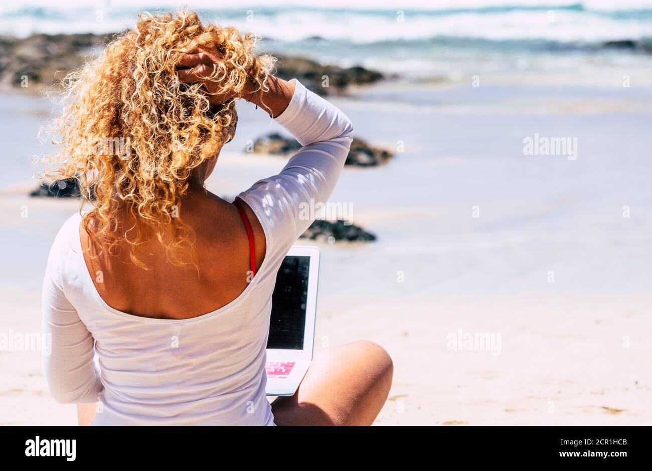 Blonde curly hi-res stock photography and images - Alamy