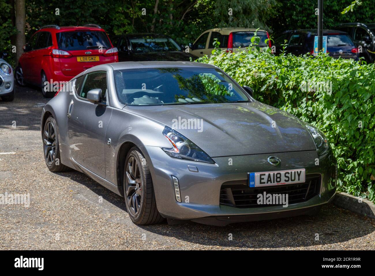 A Nissan 370Z, a 2-door, 2-seater sports car parked in a car park in Saffron Walden, Essex, UK. Stock Photo
