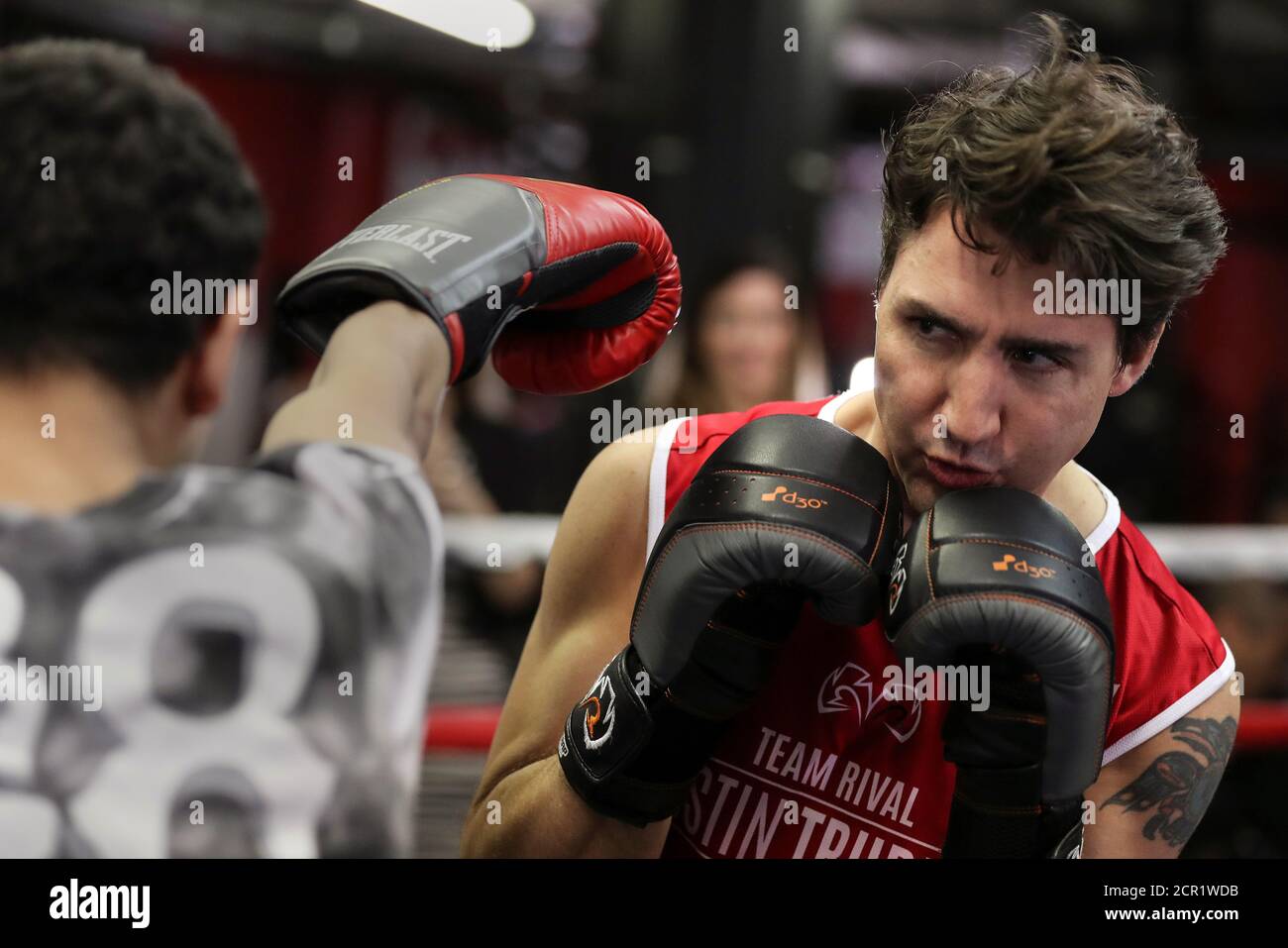 Canadian Prime Minister Justin Trudeau dodges a punch as he spars in the ring at Gleason's Boxing Gym in the Brooklyn borough of New York, U.S., April 21, 2016. REUTERS/Carlo Allegri     TPX IMAGES OF THE DAY Stock Photo
