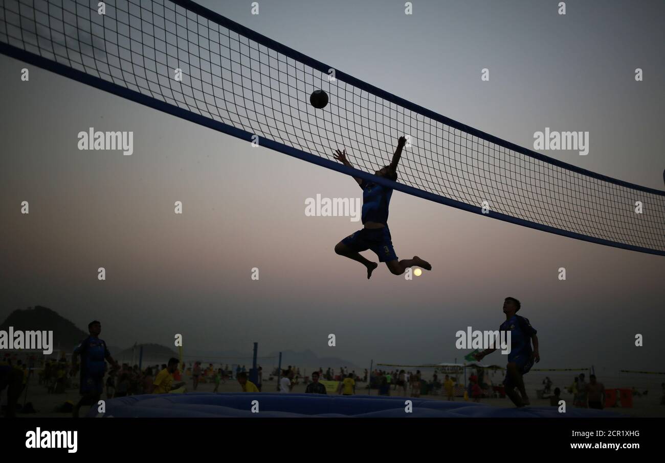 2016 Rio Olympics - Rio de Janeiro, Brazil - 17/08/2016. Tourists from  Colombia play bossaball, a combination of volleyball, football and  gymnastics, played on an inflatable court featuring a trampoline on each