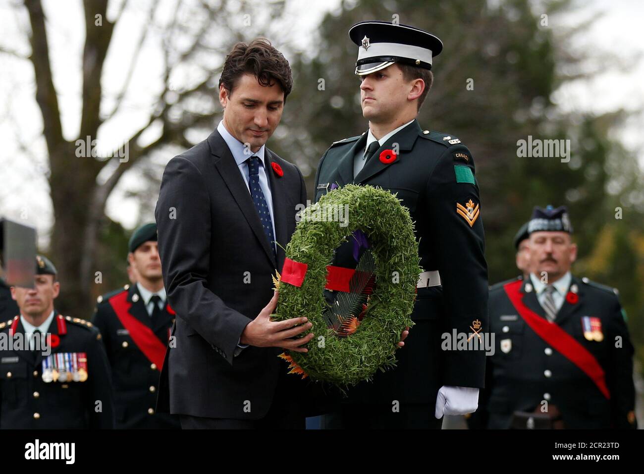 Canada's Prime Minister Justin Trudeau lays a wreath during an event to mark the upcoming Veterans' Week and 100th anniversary of the Battle of Passchendaele at the National Military Cemetery in Ottawa, Ontario, Canada, November 3, 2017. REUTERS/Chris Wattie Stock Photo