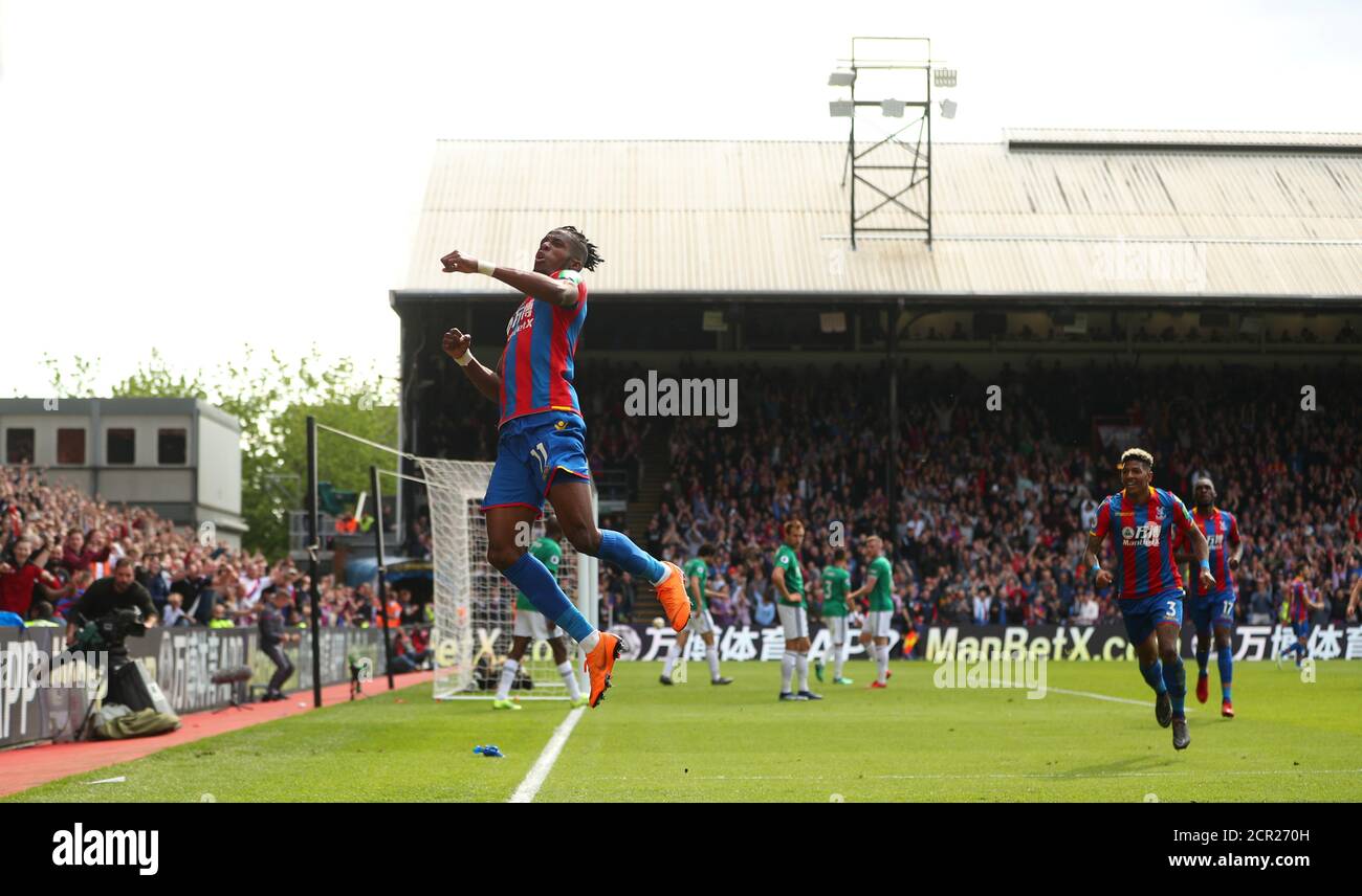 Soccer Football - Premier League - Crystal Palace vs West Bromwich Albion - Selhurst Park, London, Britain - May 13, 2018 Crystal Palace's Wilfried Zaha celebrates scoring their first goal REUTERS/Hannah McKay EDITORIAL USE ONLY. No use with unauthorized audio, video, data, fixture lists, club/league logos or "live" services. Online in-match use limited to 75 images, no video emulation. No use in betting, games or single club/league/player publications. Please contact your account representative for further details. Stock Photo
