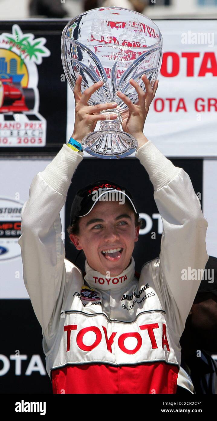 actor-frankie-muniz-sticks-out-his-tongue-as-he-hoists-the-trophy-after-winning-the-29th-annual-procelebrity-race-in-long-beach-california-april-9-2005-reuterslucy-nicholson-ln-2CR2C74.jpg