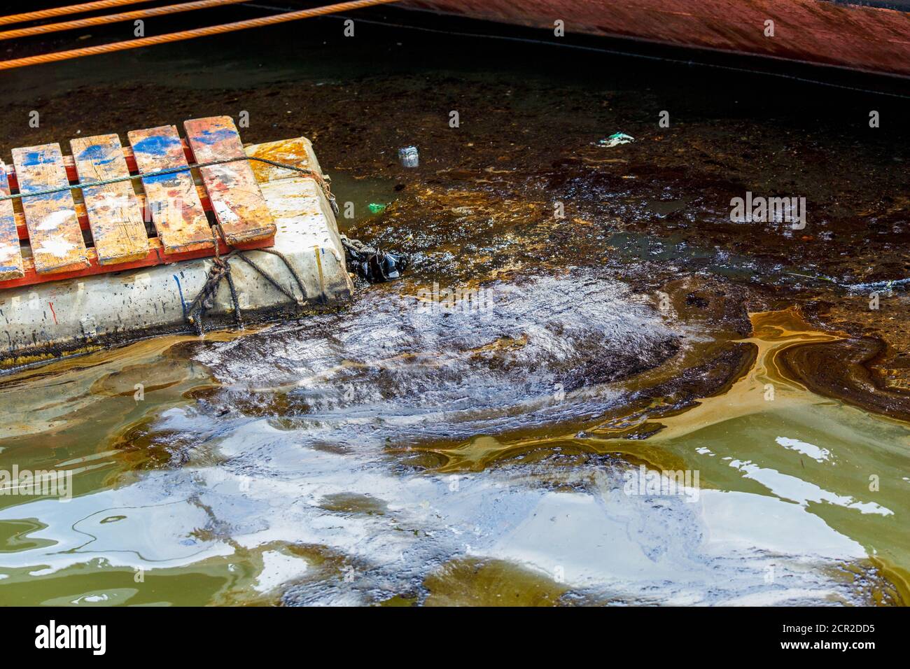 Ecological catastrophy. Spill of oil products into the sea. Stock Photo
