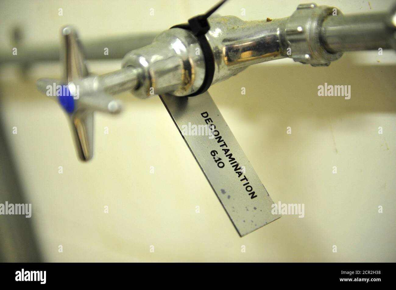 A decontamination tap is seen at a former Regional Government HQ Nuclear bunker built by the British government during the Cold War which  has come up for sale in Ballymena, Northern Ireland on February 4, 2016. It is owned by the Office of Northern Ireland's First Minister and Deputy First Minister and capable of accommodating 236 personnel for extended periods. A large range of the original fixtures and fittings are to be included in the sale. It is believed to be one of the most technically advanced bunkers built in the UK with an array of advanced life support systems. In the event of a nu Stock Photo