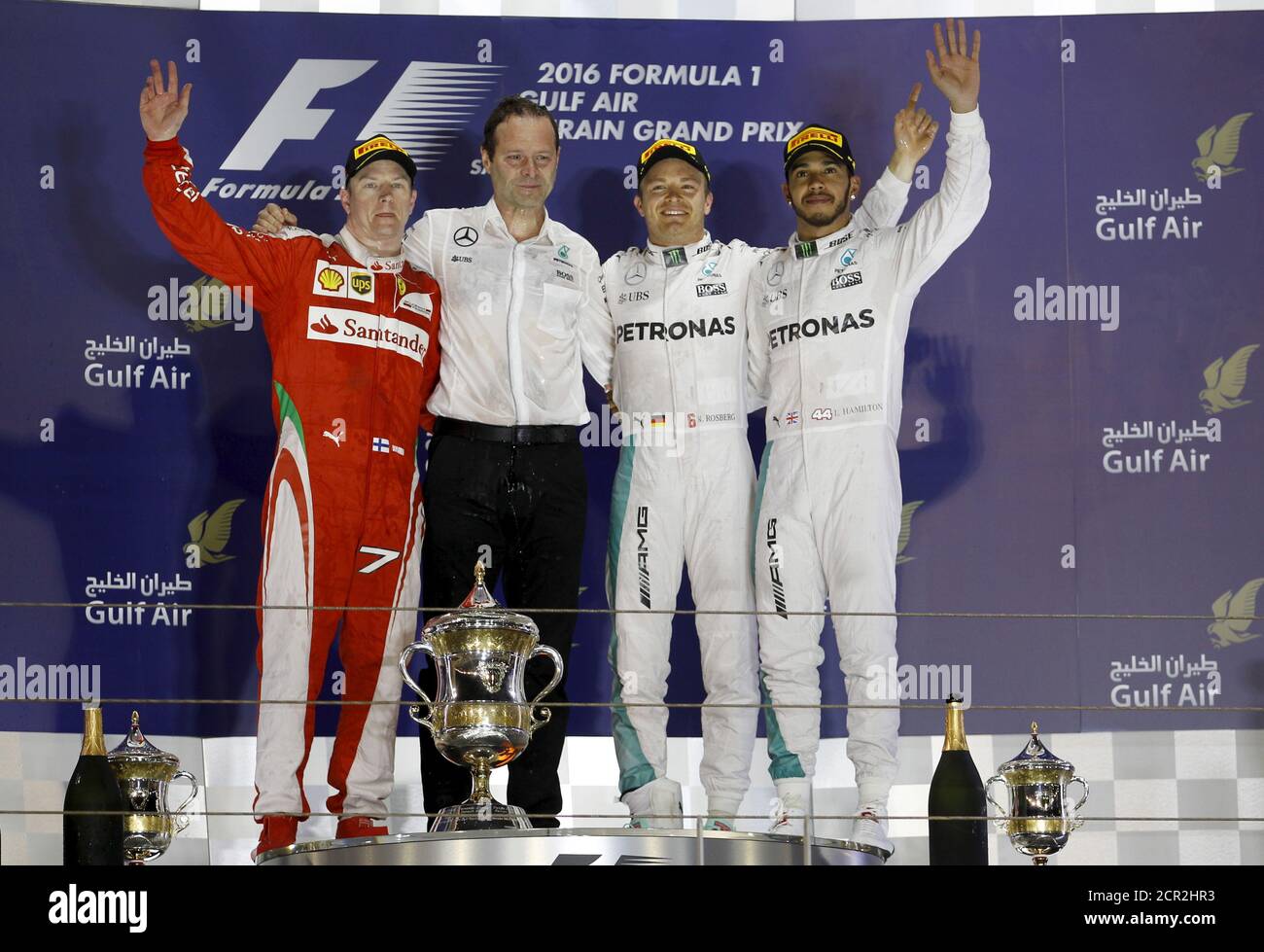 F1 Grand Prix - Sakhir, Bahrain - 03/04/16 - Ferrari F1 driver Kimi Raikkonen of Finland (L), Mercedes Team Engineer Director Aldo Costa, (2nd L), Mercedes F1 driver,