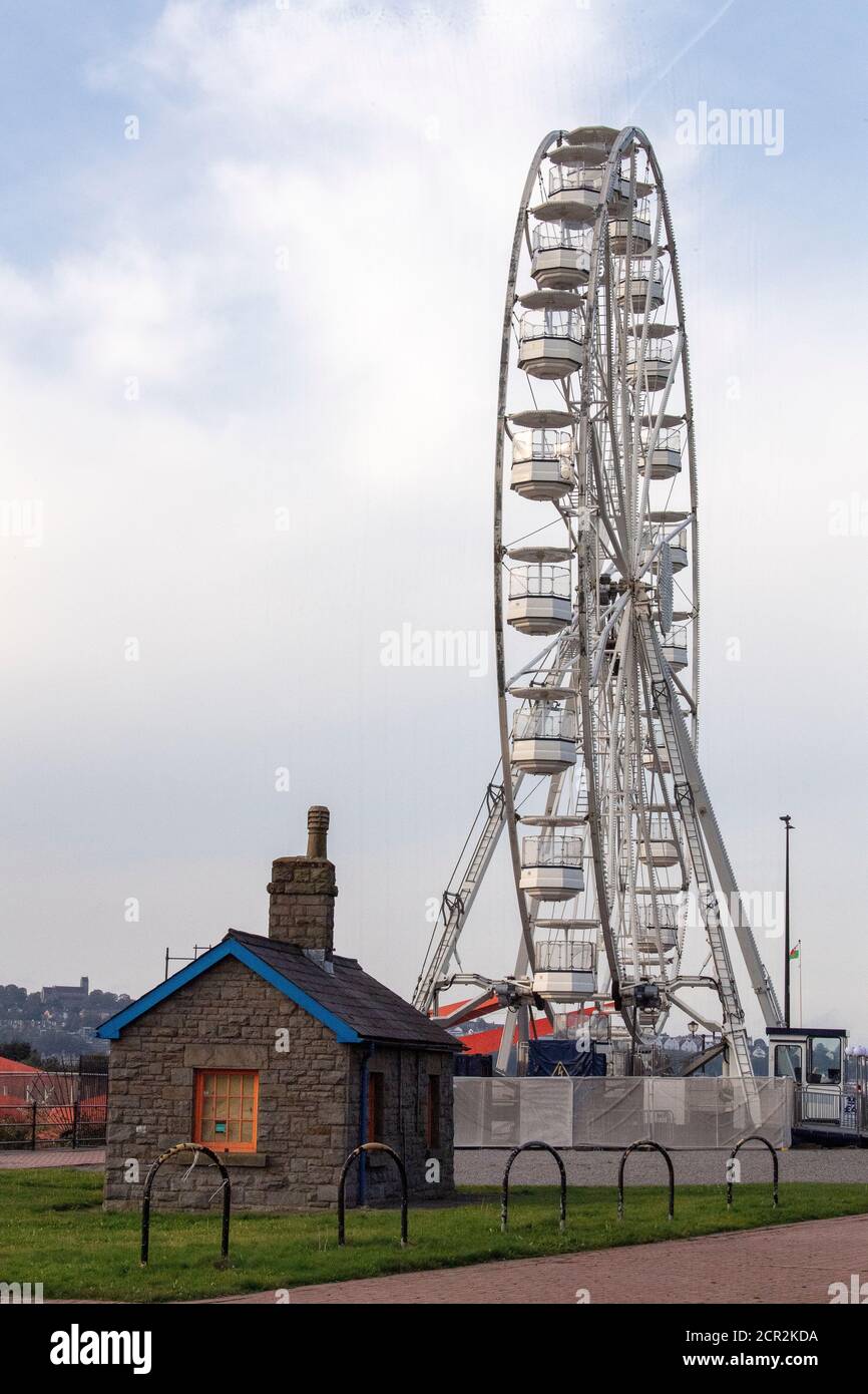 Lock keepers cafe with the Ferris Wheel in the back ground. Cardiff Bay