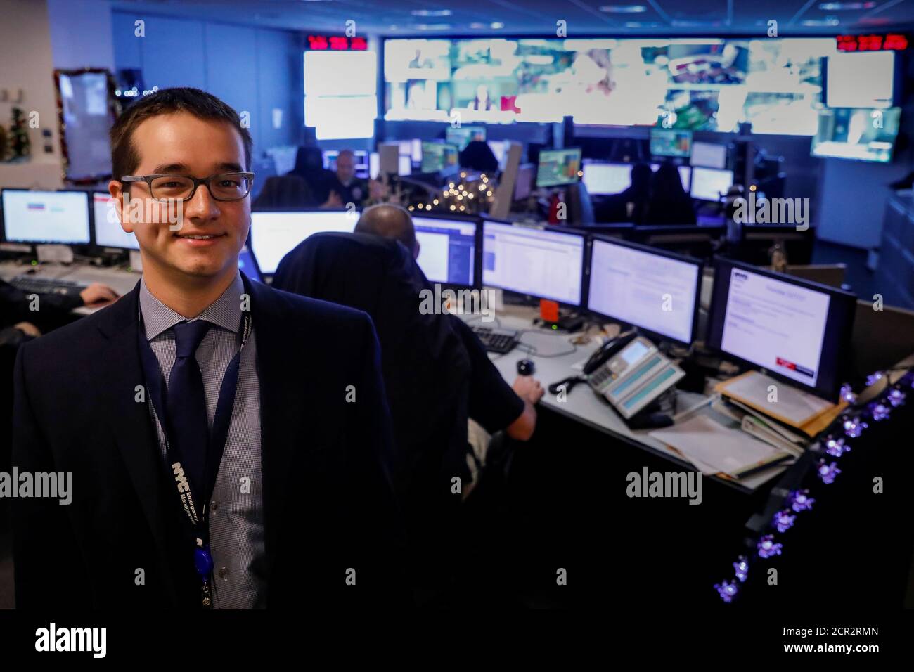 Eliot Calhoun, the Chemical, Biological, Radiological, Nuclear, and Explosives (CBRNE) Planner for NYC Emergency Management, poses in the operations center at the Emergency Management Headquarters in the Brooklyn borough of New York, U.S., December 7, 2017. Picture taken December 7, 2017.    REUTERS/Brendan McDermid Stock Photo