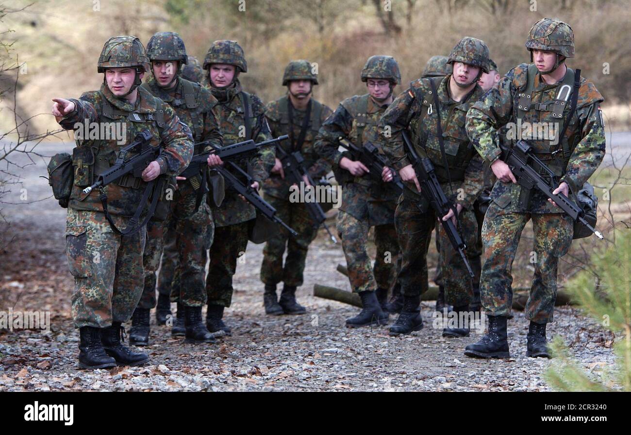A German Bundeswehr Soldier Points To Warn His Comrades During A Special Minefield Exercise In Hammelburg