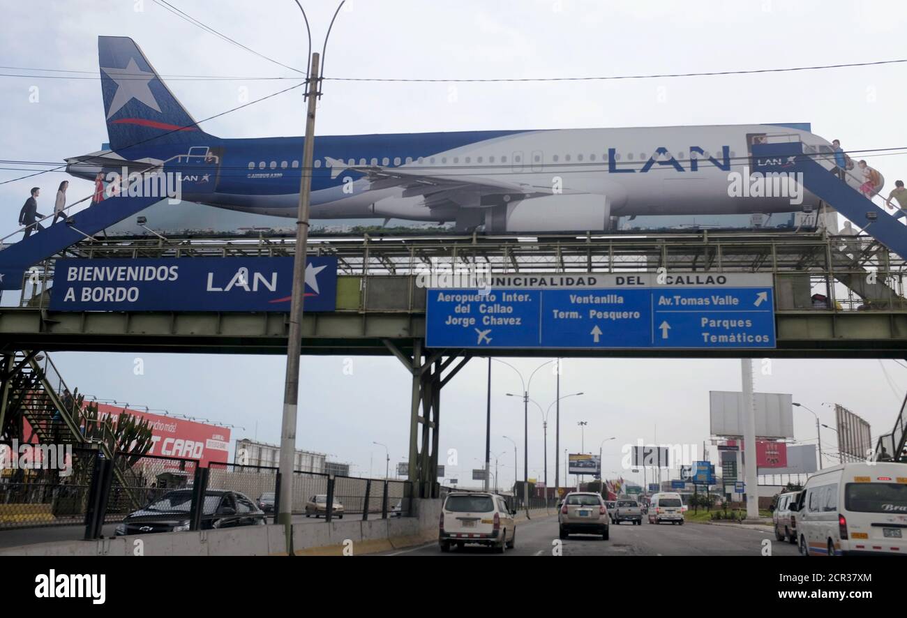 A billboard shows a plane of LAN Airlines, a member of LATAM Airlines  Group, near the Jorge Chavez airport in Callao, Peru, August 10, 2015. LATAM  Airlines Group SA, Latin America's largest