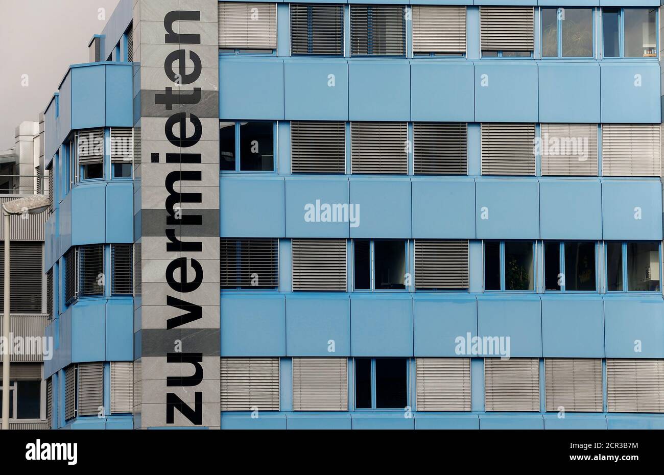 Big letters reading 'Zu vermieten' (for rent) are placed on an office building in Wallisellen near Zurich, Switzerland March 9, 2016.  REUTERS/Arnd Wiegmann Stock Photo