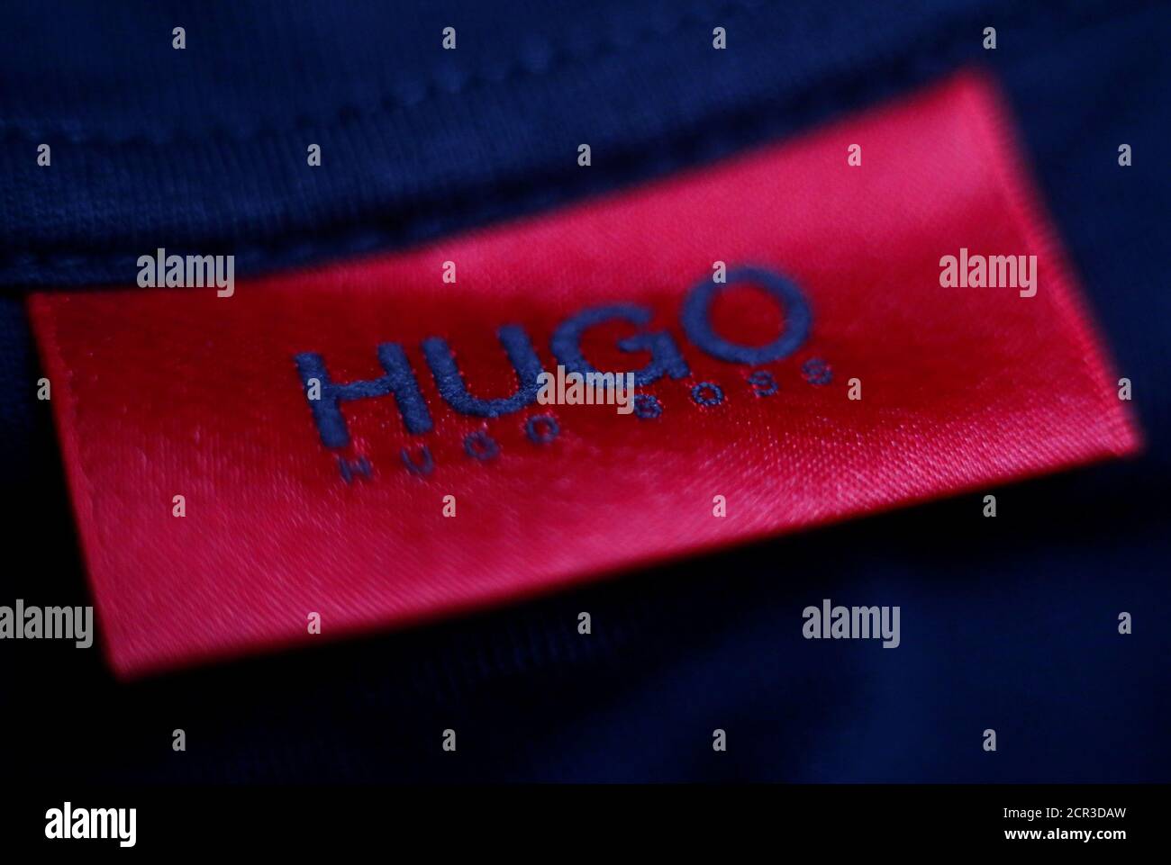 The logo of German fashion house Hugo Boss is seen on a clothing label at  their outlet store in Mezingen near Stuttgart October 29, 2013.  REUTERS/Michael Dalder/File Photo GLOBAL BUSINESS WEEK AHEAD