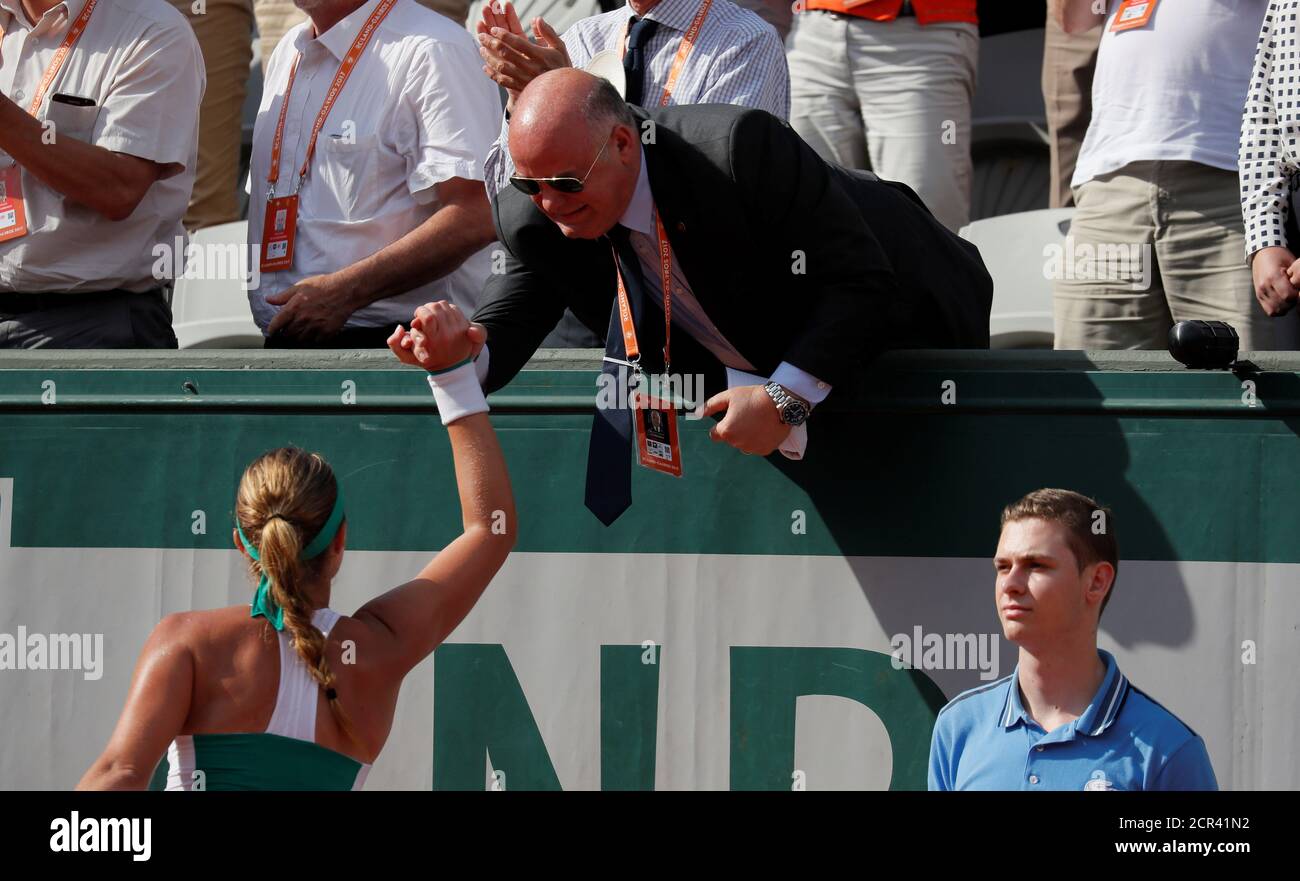 Tennis - French Open - Roland Garros, Paris, France - 31/5/17 France's Kristina Mladenovic celebrates with President of the French Federation Bernard Giudicelli after winning her second round match against Italy's Sara Errani Reuters / Gonzalo Fuentes Stock Photo