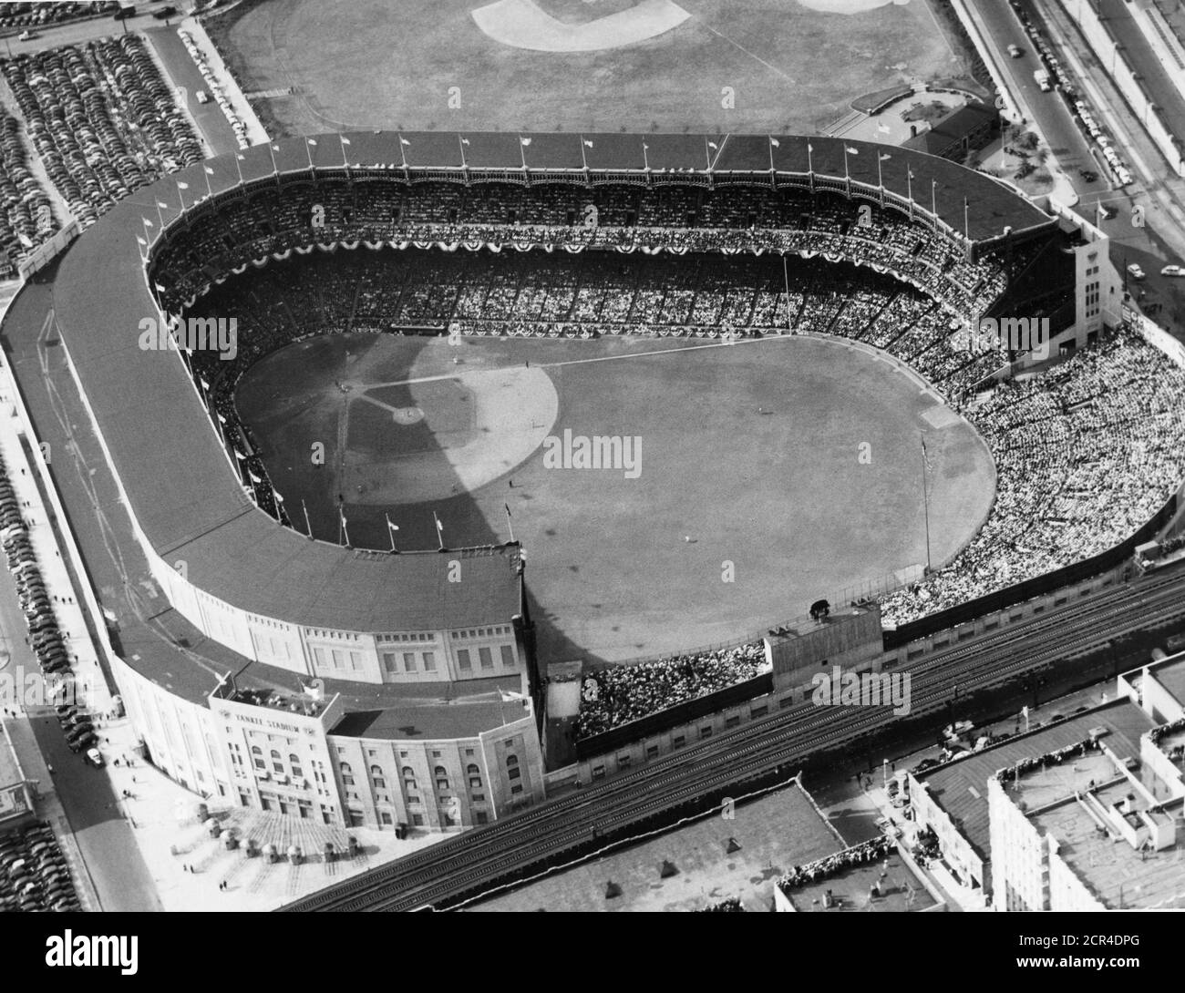 Aerial view of Yankee Stadium with a capacity-filled audience during a baseball game, New York, NY, 1954. (Photo by RBM Vintage Images) Stock Photo