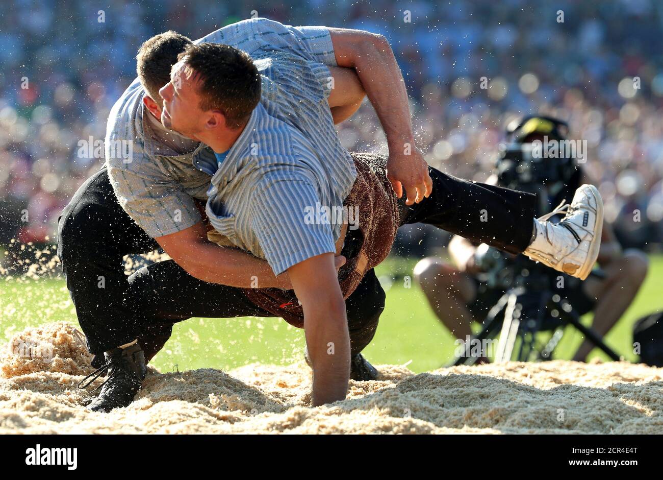 Swiss Alpine Wrestlers Armon Orlik L And Kilian Wenger Fight During The First Round Of The Federal Alpine Wrestling Festival Eidgenoessisches Schwing Und Aelplerfest In Estavayer Le Lac Switzerland August 27 2016 Reuters Ruben Sprich