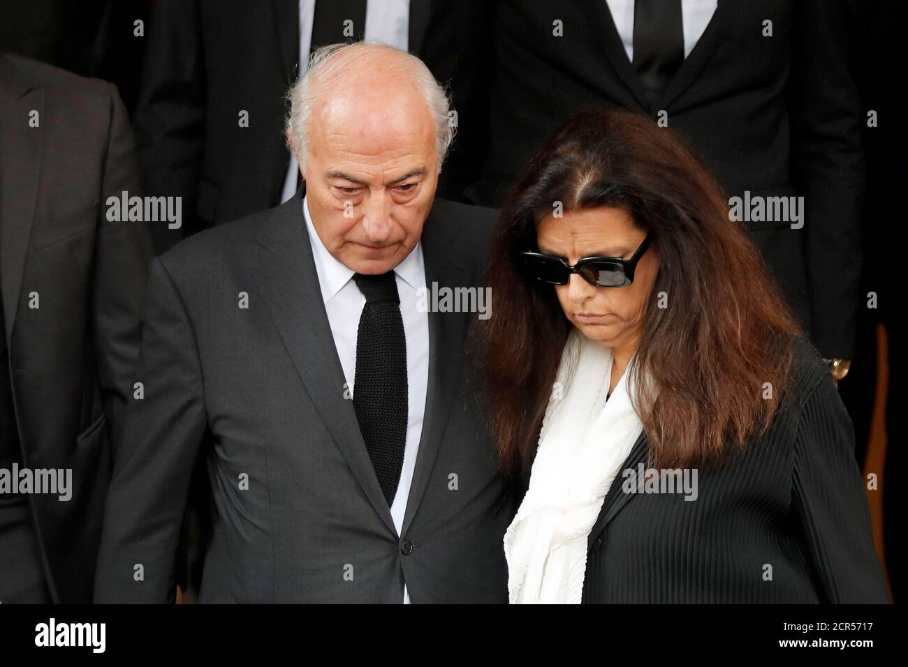 Francoise Bettencourt Meyers (R) and her husband Jean-Pierre Meyers (L)  leave after the funeral ceremony for French businesswoman and billionaire  Liliane Bettencourt,, whose family founded cosmetics giant L'Oreal, in  Neuilly-sur-Seine near Paris,