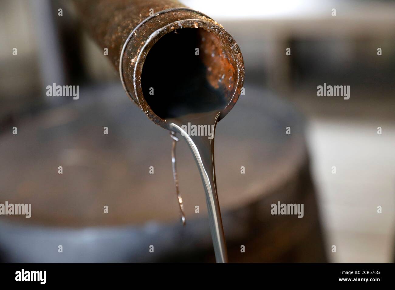 Oil pours out of a spout from Edwin Drake's original 1859 well that launched the modern petroleum industry at the Drake Well Museum and Park in Titusville, Pennsylvania U.S., October 5, 2017. REUTERS/Brendan McDermid Stock Photo