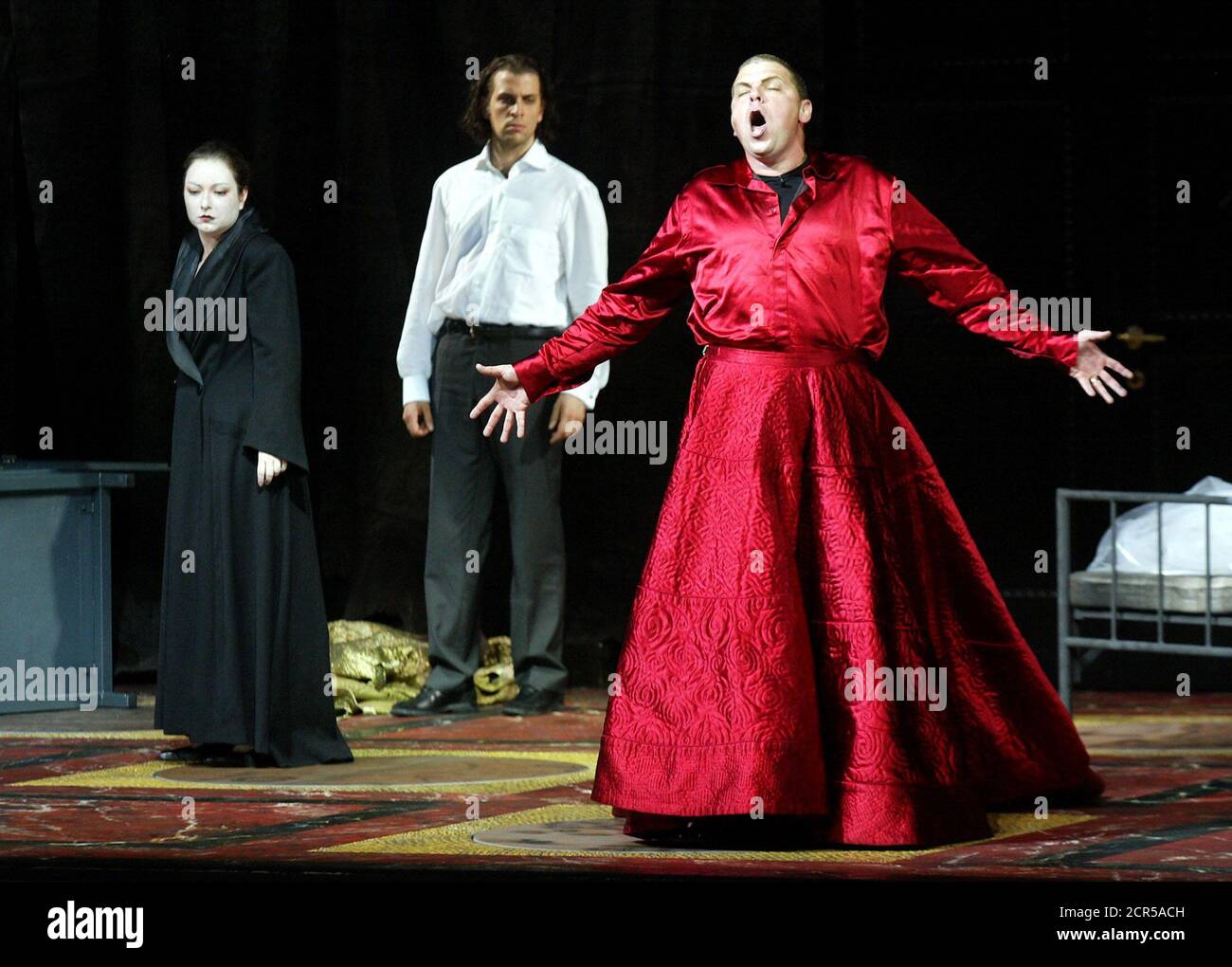 Michael Schade is seen as Tito Vespasiano (R), Luca Pisaroni as Publio (C) and Dorothea Roeschmann as Vitellia (L) during a dress rehearsal of Wolfgang Amadeus Mozart's opera 'La Clemenza di Tito'. Picture taken at the Salzburg Festival August 1, 2003. The world famous cultural Salzburg Festival (Salzburger Festspiele) lasts from Friday July 25 to Sunday August 31 and the play has its premiere night August 6, 2003. REUTERS/Leonhard Foeger REUTERS  LF/ Stock Photo