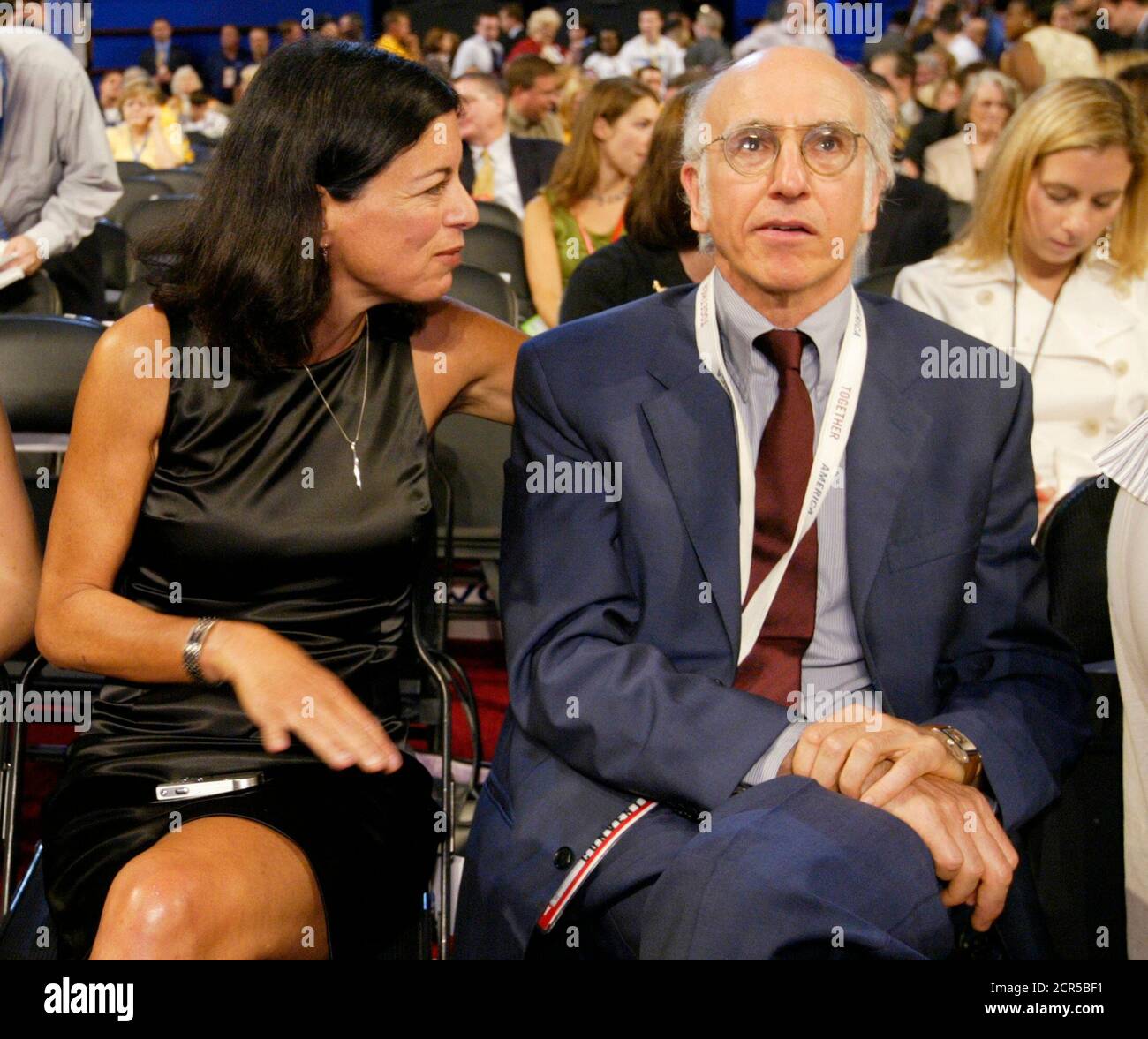 Actor Larry David, of the television program 'Curb Your Enthusiasm,' and his wife Laurie attend the third day of the 2004 Democratic National Convention at the FleetCenter in Boston, July 28, 2004. John Kerry arrived in Boston on Wednesday to be formally be anointed as the Democratic challenger to President Bush on a night when his running mate John Edwards takes center stage for the biggest speech of his career. REUTERS/John Gress US ELECTION  HB/ Stock Photo