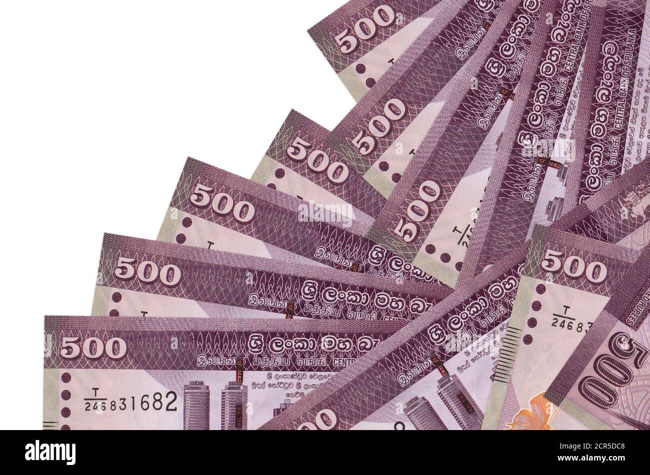 500 Sri Lankan rupees bills lies in different order isolated on white ...