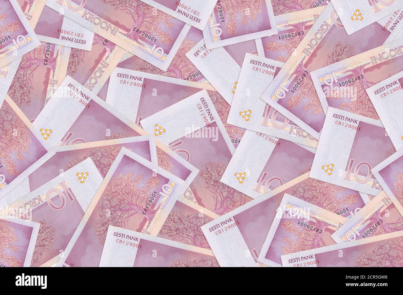 10 Estonian kroon bills lies in big pile. Rich life conceptual background. Big amount of money Stock Photo